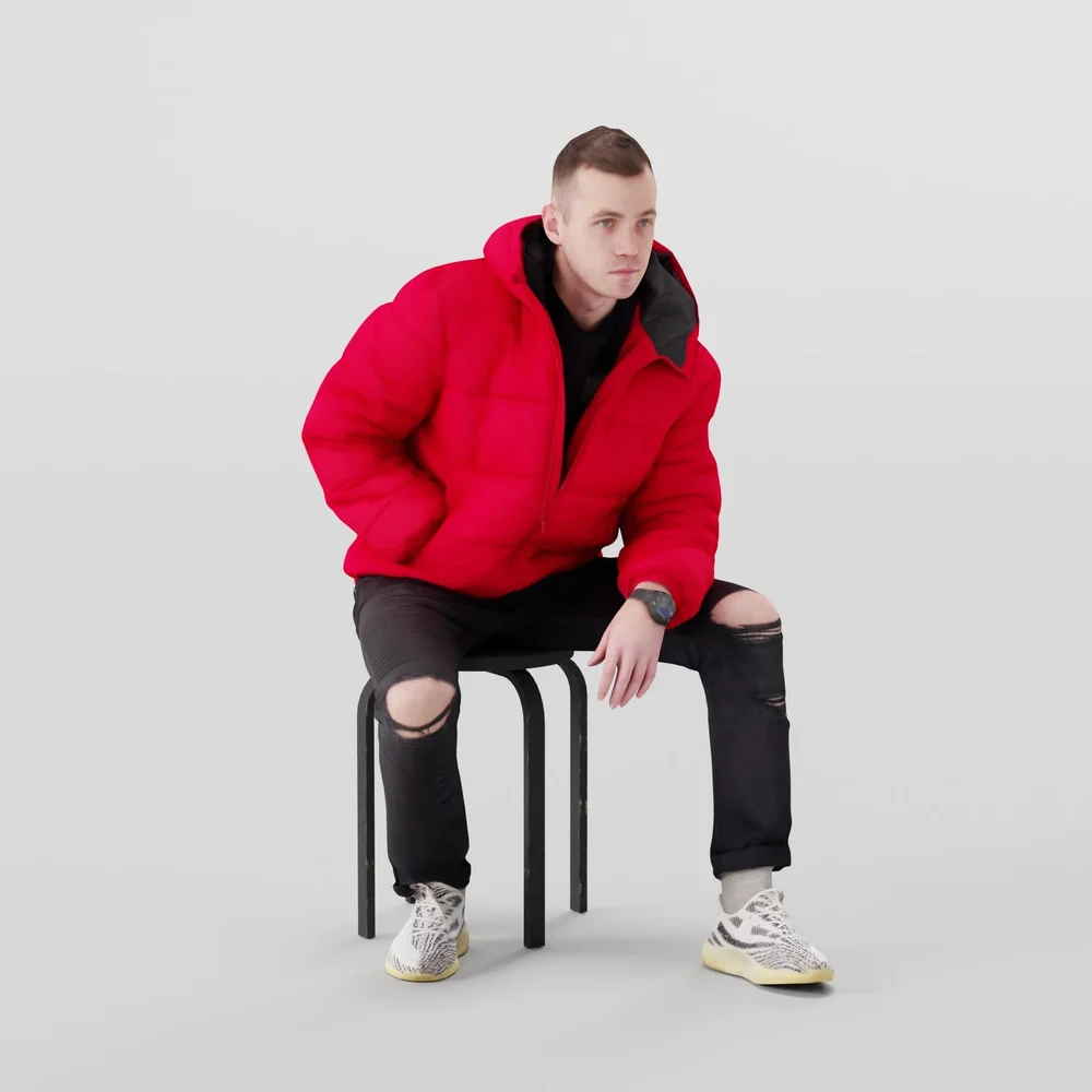 Guy In Jeans With Torn Knees Sitting