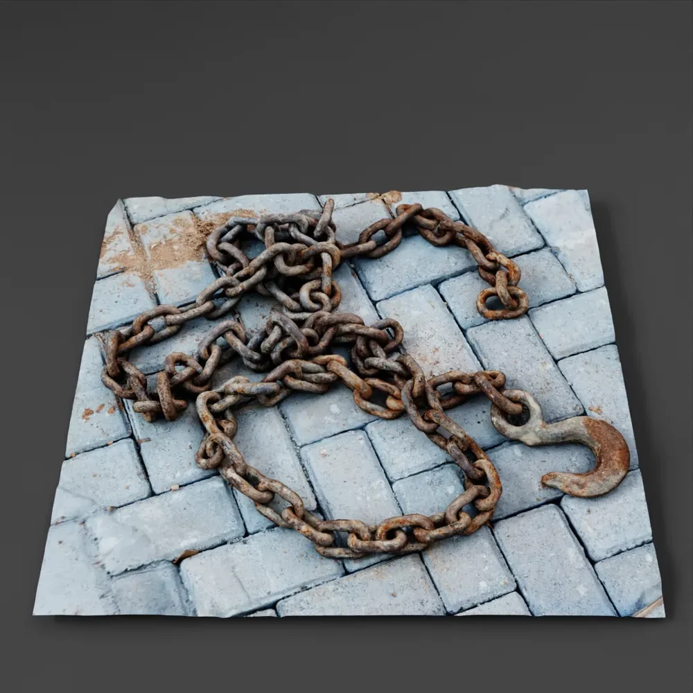 Rusty Chain On Stone Pavement