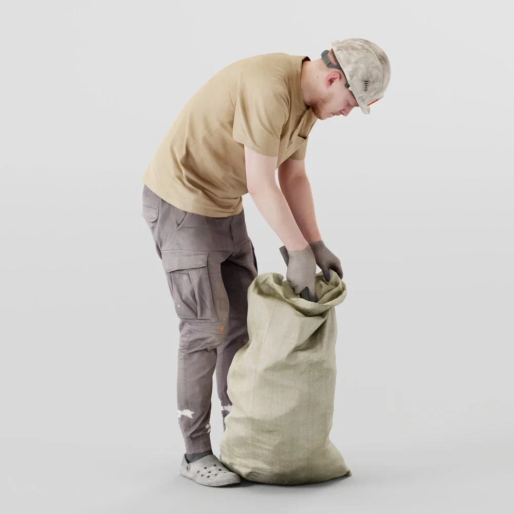 Worker Picks Up Garbage In A Bag