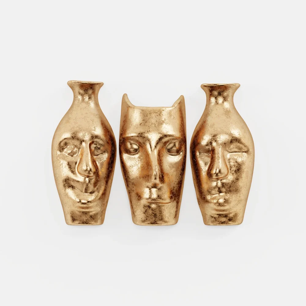 Trio Of Sculpted Faces