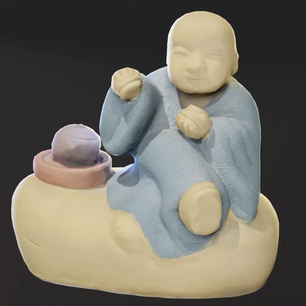 Monk Figurine With A Teapot