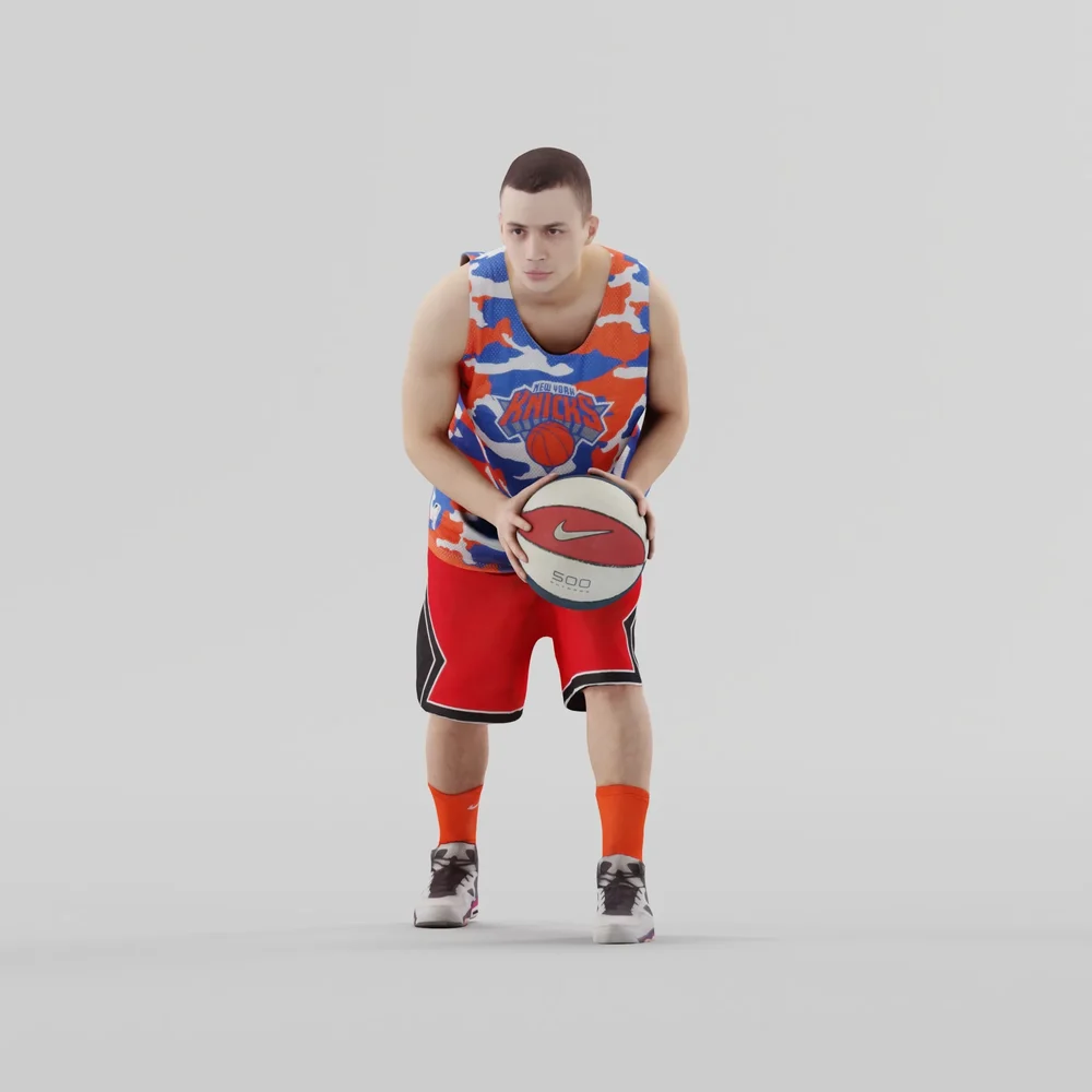 Basketball Player Holds Ball