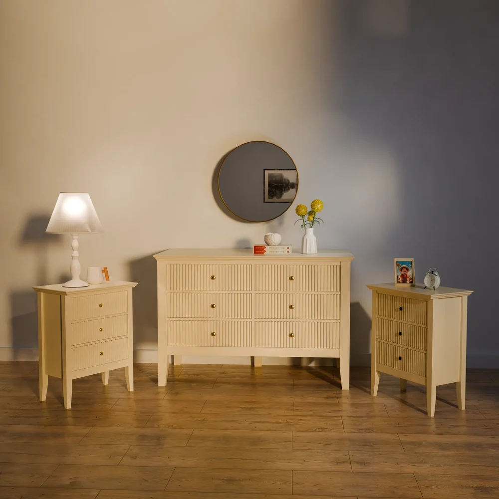 A Dresser With Matching Nightstands