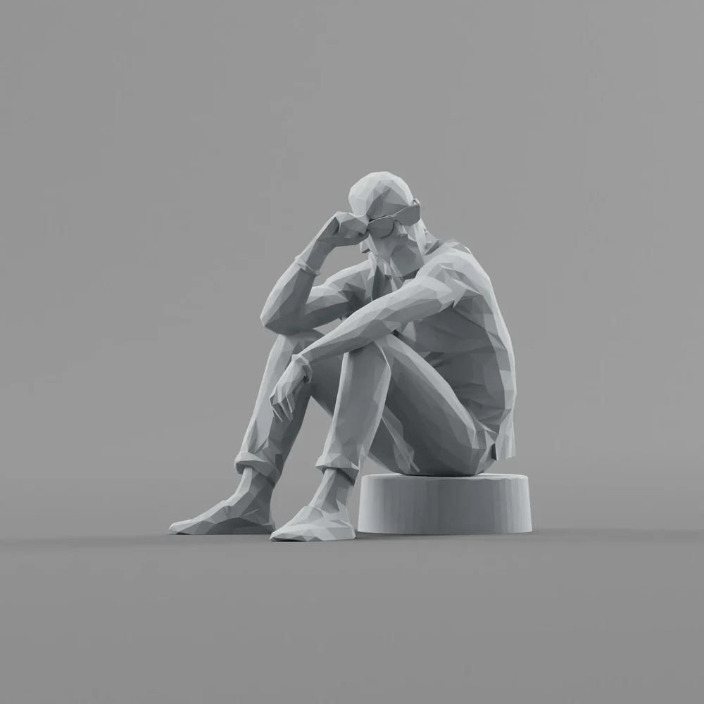 Lowpoly Male Siitng On Pavement