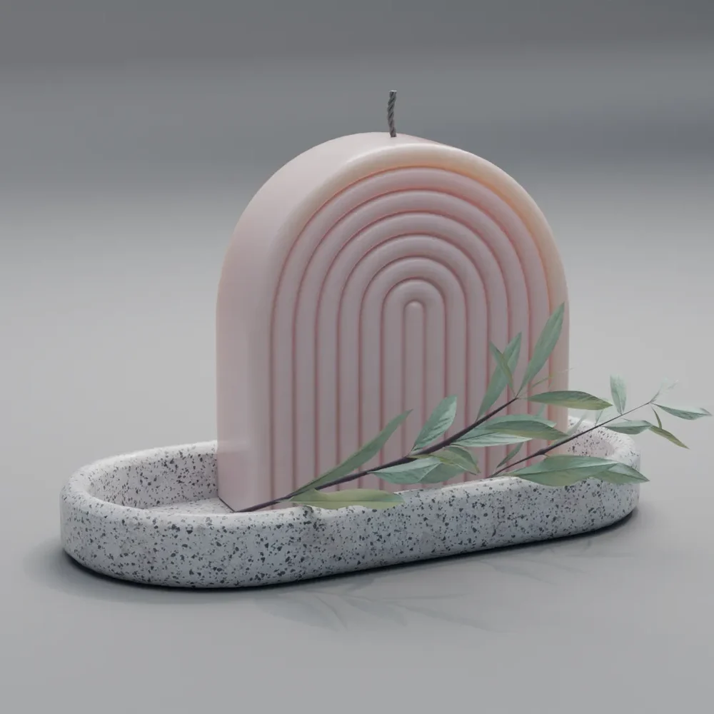 Interior Decoration Piece: Minimalist Arch Candle On Top Of A Speckled, Terrazzo-Style Tray With A Sprig Of Greenery