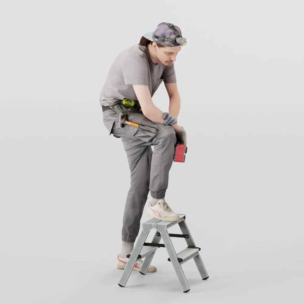 Worker In Gray Stands On A Stepladder